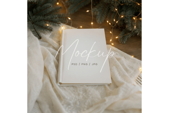 Cozy Winter Book Mockup with Lights: A Stationery Mockups Standout for Seasonal Design